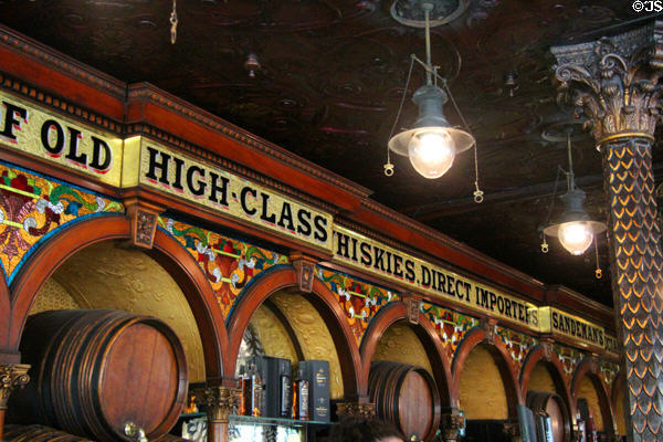 Decoration & light fixtures over bar at Crown Liquor Saloon. Belfast, Northern Ireland.