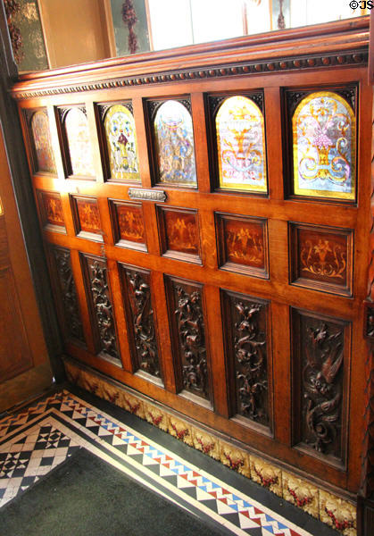 Snug partition with carvings & stained glass at Crown Liquor Saloon. Belfast, Northern Ireland.