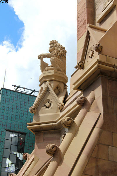 Lion statue on Albert Clock tower (1870) in Queen's Square. Belfast, Northern Ireland.