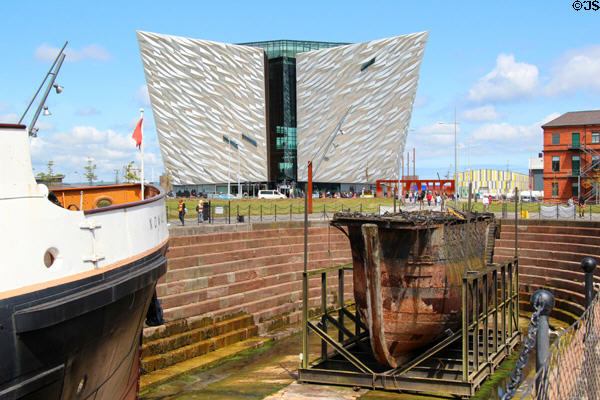 Titanic Belfast building over dry dock & display ships in restored Titanic Quarter. Belfast, Northern Ireland.
