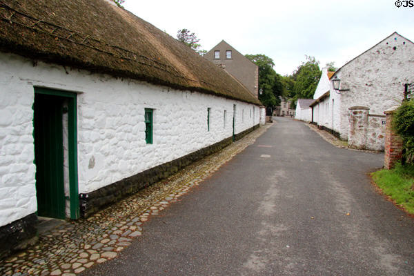 Thatched roof buildings (c1859) from Ballyvollen at Ulster Folk Park. Belfast, Northern Ireland.