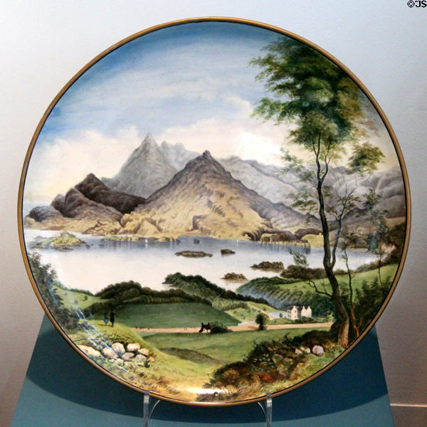 Earthenware landscape painted wall plaque (1863-90) by Eugene Sheerin for Belleek at Ulster Museum. Belfast, Northern Ireland.