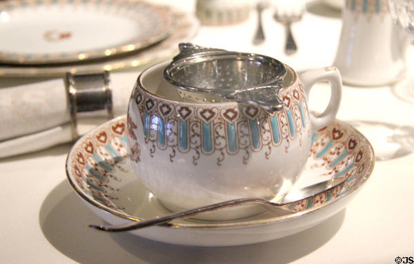 Titanic & Olympic tea cup & silver strainer at Ulster Transport Museum. Belfast, Northern Ireland.