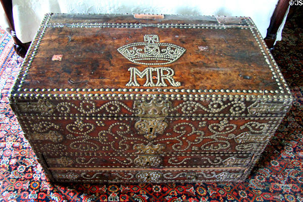 Wooded chest with royal crown in bedroom at Florence Court. Enniskillen, Northern Ireland.