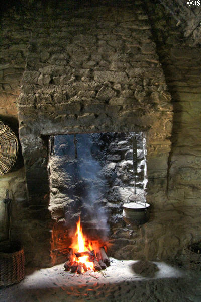 Fireplace in Single Room Cabin (late 1700s) at Ulster American Folk Park. Omagh, Northern Ireland.
