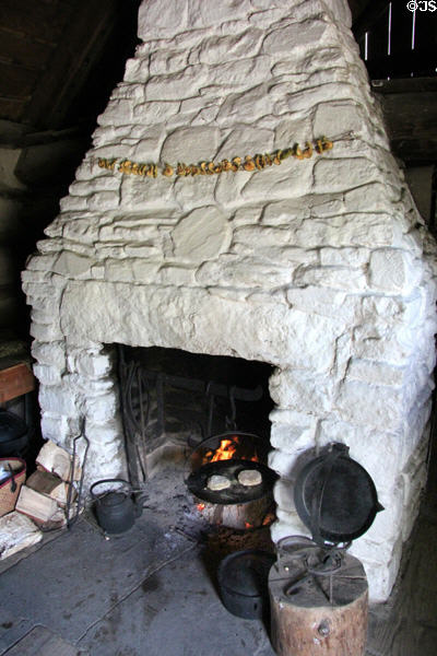 Log Cabin fireplace at Ulster American Folk Park. Omagh, Northern Ireland.