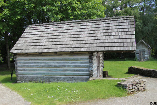 Springhouse on Pennsylvania log farm at Ulster American Folk Park. Omagh, Northern Ireland.