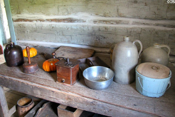 Collections of vessels in Western Pennsylvania Log House at Ulster American Folk Park. Omagh, Northern Ireland.