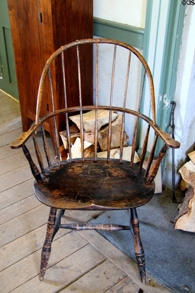 Windsor chair in brick house at Ulster American Folk Park. Omagh, Northern Ireland.