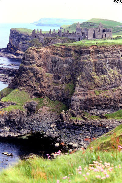 Dunluce Castle perched on cliffs. Northern Ireland.