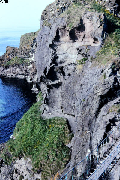Carrick-a-rede Rope Bridge (bottom right) an exciting walk to a bird sanctuary island. Northern Ireland.