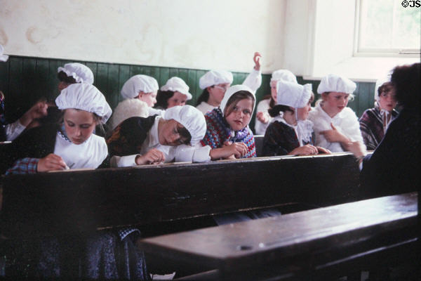 School children learning how classes were held in times past at Ulster Folk & Transport Museum. Northern Ireland.