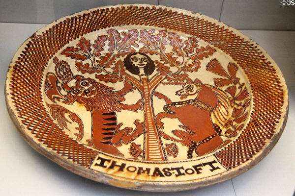 Earthenware slip glazed dish depicting escape of Charles II from Parliamentary forces during Civil War (1641-51) (made 1671-89) by Thomas Toft of North Staffordshire at British Museum. London, United Kingdom.