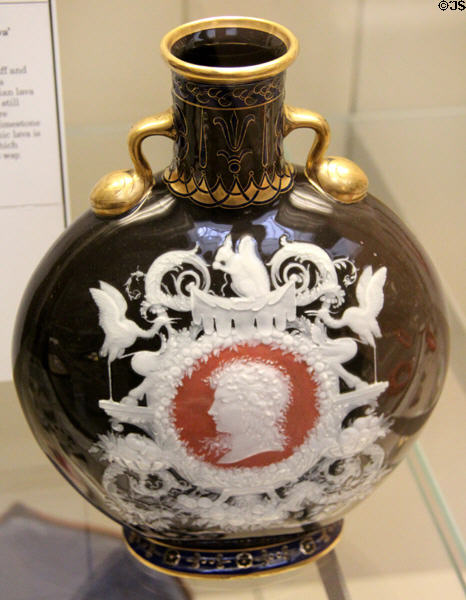 Porcelain flask with cameo head of Medusa (1879) by Thomas Mellor made by Minton & Co of Stoke-on-Trent at British Museum. London, United Kingdom.
