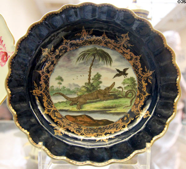 Porcelain dessert plate painted with crocodile & serpent (1770) perhaps by Jeffreyes Hamett O'Neale for Worcester factory at British Museum. London, United Kingdom.