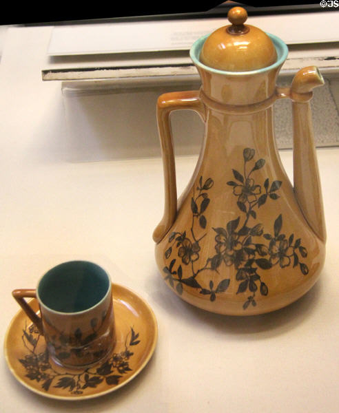 Earthenware coffee pot with cup & saucer (1879-82) by Linthorpe Art Pottery at British Museum. London, United Kingdom.
