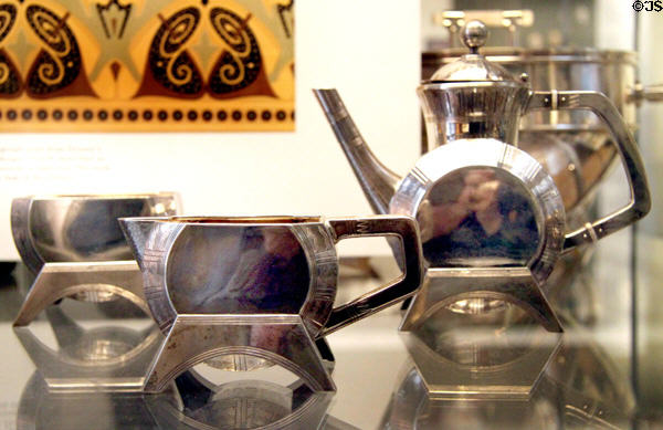 Silver tea set with drum-shaped body (1885) by Christopher Dresser made by Elkington & Co. of Birmingham at British Museum. London, United Kingdom.