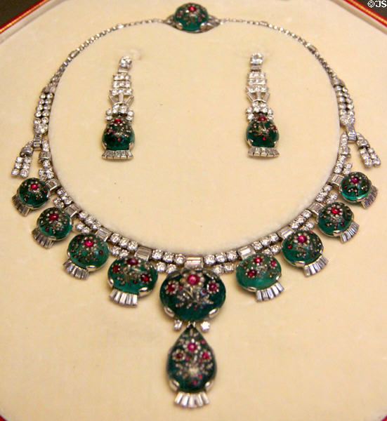 Necklace & earrings containing jewel flowers (1937) by Cartier of London at British Museum. London, United Kingdom.