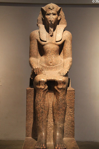 Red granite seated statue of Sobekemsaf I (17th Dynasty - c1603 BCE) from Karnak at British Museum. London, United Kingdom.