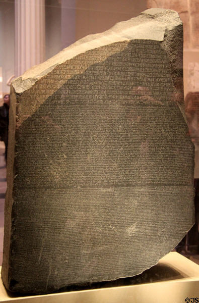 Rosetta Stone is inscribed with three versions of a decree: Ancient Egyptian in hieroglyphics & Demotic scripts plus Ancient Greek which was used to decode the top two writings. (Ptolemaic Dynasty - 196 BCE) at British Museum. London, United Kingdom.