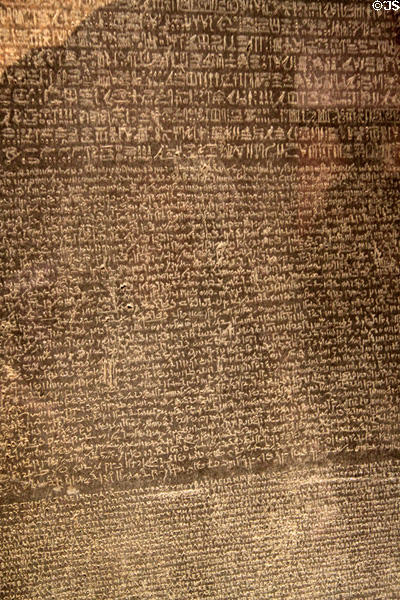 Details of three ancient languages inscribed on Rosetta Stone at British Museum. London, United Kingdom.