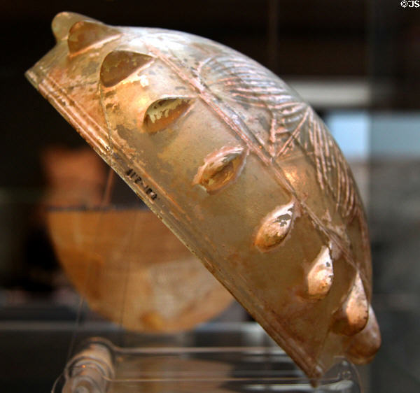 Glass bowl with band of bosses & with rosette cut on bottom (c225-200 BCE) made in eastern Mediterranean at British Museum. London, United Kingdom.