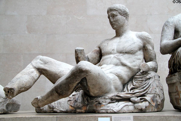 Reclining youth (probably Dionysus, god of wine) on east pediment of Athens Parthenon (447-438 BCE) by Pheidias at British Museum. London, United Kingdom.