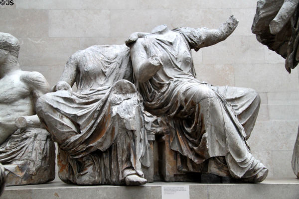 Two seated goddesses (perhaps Persephone & Demeter) on east pediment of Athens Parthenon (447-438 BCE) by Pheidias at British Museum. London, United Kingdom.