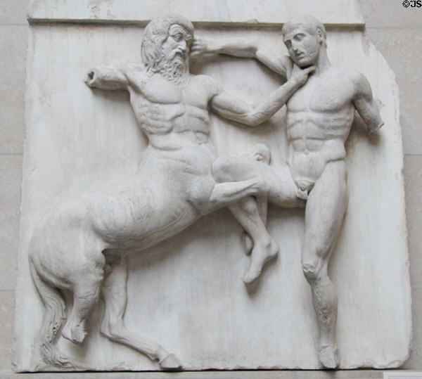 Centaur wrestles Lapith marble metope section (south XXXI) of Athens Parthenon Frieze (447-438 BCE) by Pheidias at British Museum. London, United Kingdom.