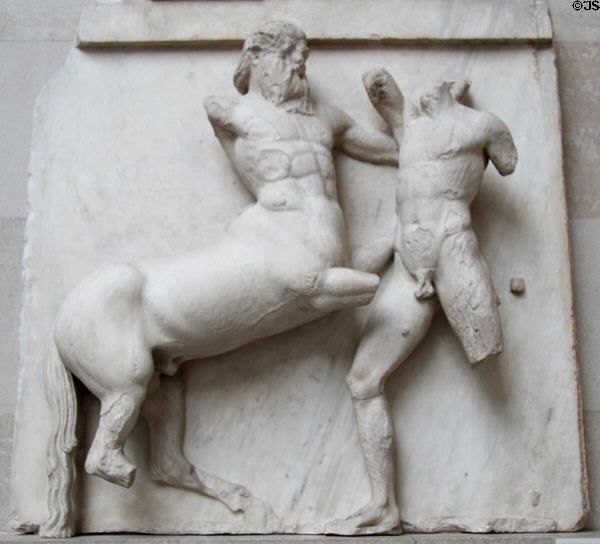 Centaur grips hair of Lapith marble metope section (south XXXII) of Athens Parthenon Frieze (447-438 BCE) by Pheidias at British Museum. London, United Kingdom.