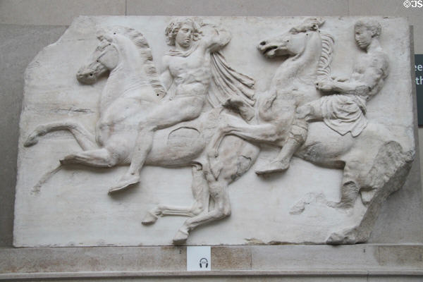 Panathenaic festival horsemen procession marble relief (Block II) from west frieze of Athens Parthenon (447-438 BCE) by Pheidias at British Museum. London, United Kingdom.