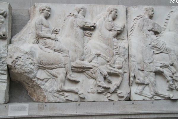 Panathenaic festival horsemen procession marble relief (Block XI) from south frieze of Athens Parthenon (447-438 BCE) by Pheidias at British Museum. London, United Kingdom.