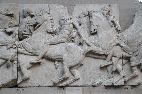 Panathenaic festival horsemen procession marble relief (Block XLI) from north frieze of Athens Parthenon (447-438 BCE) by Pheidias at British Museum. London, United Kingdom.