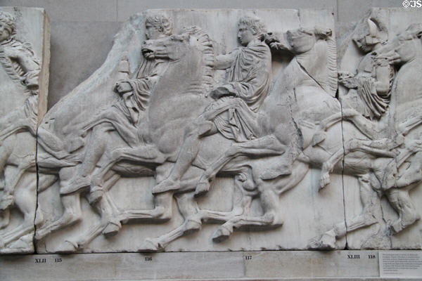 Panathenaic festival horsemen procession marble relief (Block XLII) from north frieze of Athens Parthenon (447-438 BCE) by Pheidias at British Museum. London, United Kingdom.