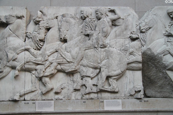 Panathenaic festival horsemen procession marble relief (Block XLIII) from north frieze of Athens Parthenon (447-438 BCE) by Pheidias at British Museum. London, United Kingdom.