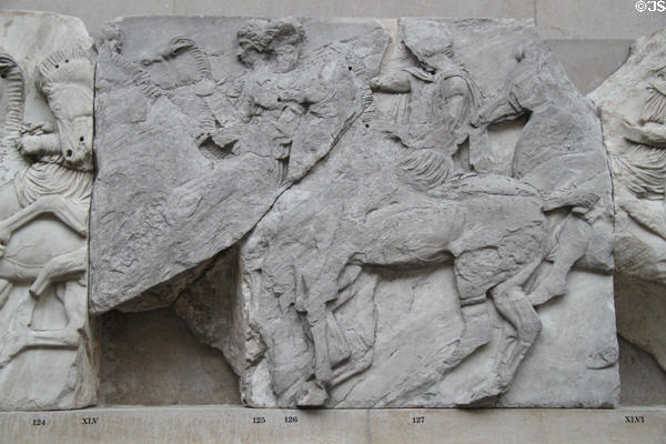 Panathenaic festival horsemen procession marble relief (Block XLV) from north frieze of Athens Parthenon (447-438 BCE) by Pheidias at British Museum. London, United Kingdom.