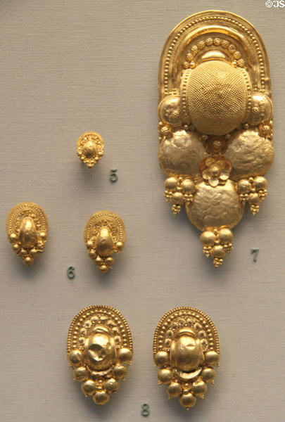 Etruscan gold earrings (400-300 BCE) from Italy at British Museum. London, United Kingdom.
