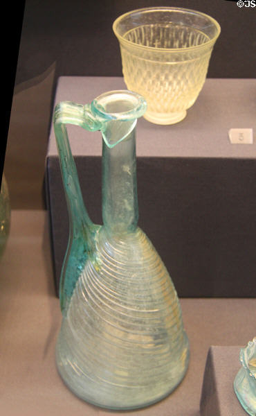 Roman era glass flagon plus cut-glass beaker (1stC CE) found in Cambridgeshire at British Museum. London, United Kingdom.