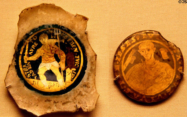 Roman glass disks with gold images of gladiator & beardless man (4thC CE) from Rome at British Museum. London, United Kingdom.