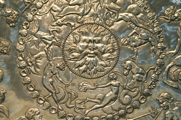 Detail of Neptune on Mildenhall Treasure Roman tableware silver Great Neptune Dish with relief musical & dancing figures 60.5cm diameter (4thC CE) at British Museum. London, United Kingdom.