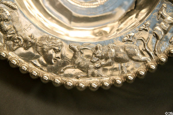Detail of Roman flanged silver bowl with hunting scene (4thC CE) part of Mildenhall Treasure at British Museum. London, United Kingdom.