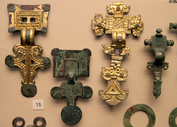 Anglo-Saxon type bronze square head or cruciform brooches (6thC) from eastern England at British Museum. London, United Kingdom.