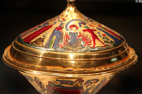 St Agnes is condemned to be burned alive, but flames refuse so she is killed by a spear to her throat shown on Royal gold cup (c1370-80) from Paris at British Museum. London, United Kingdom.