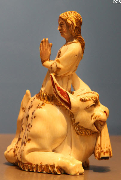 Ivory carving of St Margaret bursting free after being swallowed by Satan in form of dragon & becoming patron saint of child birth (c1325-50) from Paris at British Museum. London, United Kingdom.