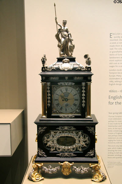 English table clock which only needed winding once per year topped by statue of Britannia (c1690) by Thomas Tompion at British Museum. London, United Kingdom.