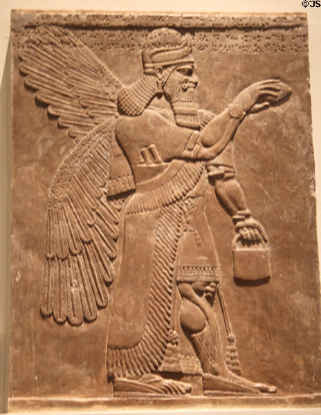 Assyrian winged protective spirit (c865-860 BCE) guarding doorway of North-West Palace from Nimrud at British Museum. London, United Kingdom.