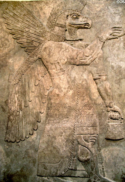 Assyrian eagle-headed protective spirit (c865-860 BCE) guarding doorway of North-West Palace from Nimrud at British Museum. London, United Kingdom.