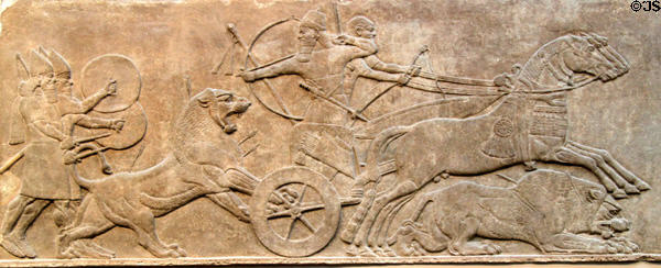 Assyrian lion hunt carved panel (c865-860 BCE) from North-West Palace of Nimrud at British Museum. London, United Kingdom.