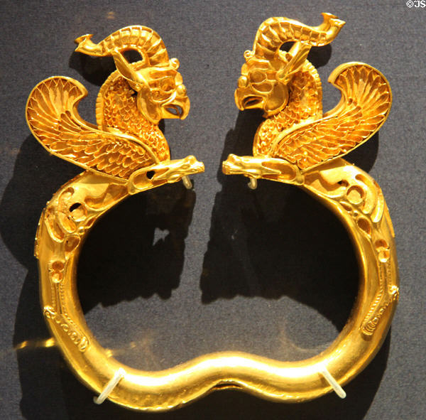 Ancient Iranian Achaemenid culture gold armlets of winged monsters with griffin heads (5thC-4thC BCE) found in Oxus River Treasure, Tajikistan at British Museum. London, United Kingdom.