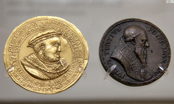 Gold medal of Henry VIII as new Supreme Head of Church of England (1545) & Bronze medal of Pope Julius III (1554) by Giovanni da Cavino at British Museum. London, United Kingdom.